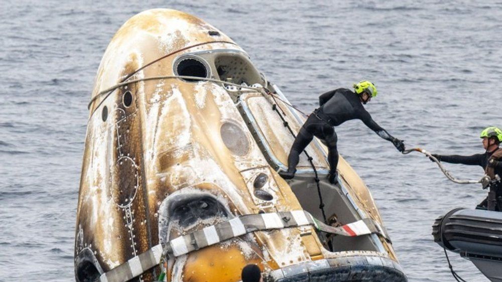 Video: Nach 18 Stunden: Astronauten von Raumstation auf der Erde gelandet