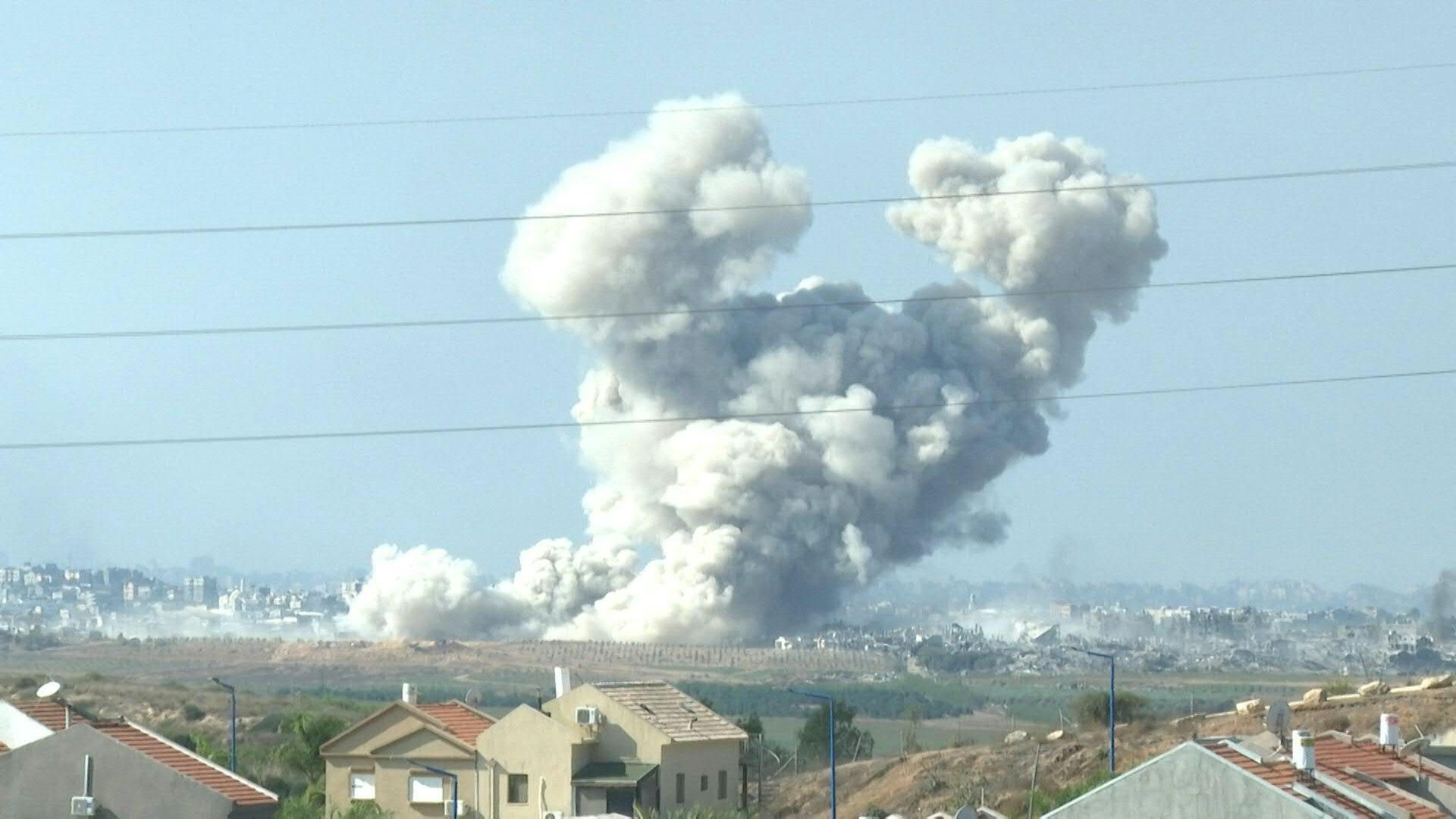Explosion and smoke in northern Gaza seen from Israel