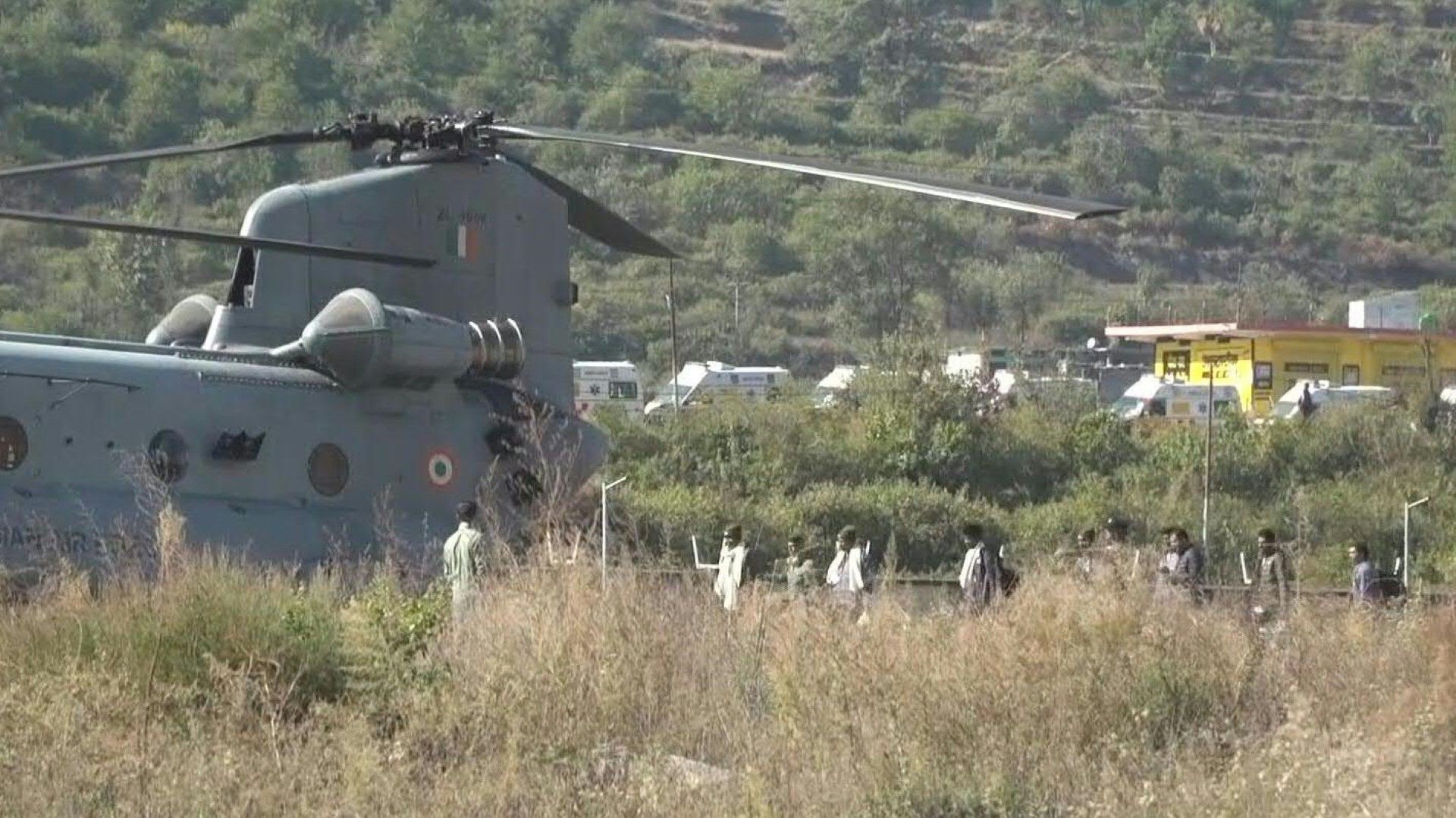 Rescued Indian workers board helicopter to be airlifted to hospital in Rishikesh