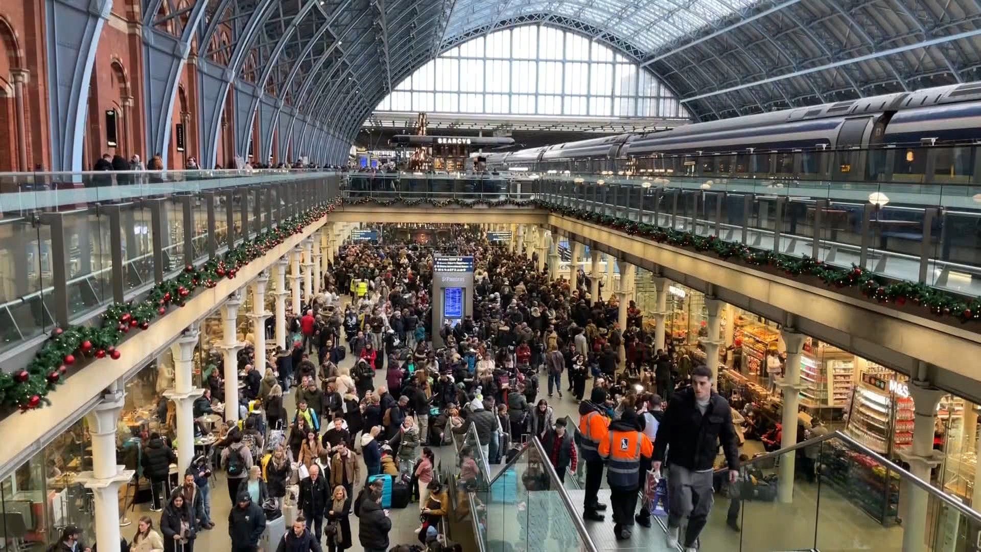 Large crowds at London's St Pancras as floods disrupt Eurostar