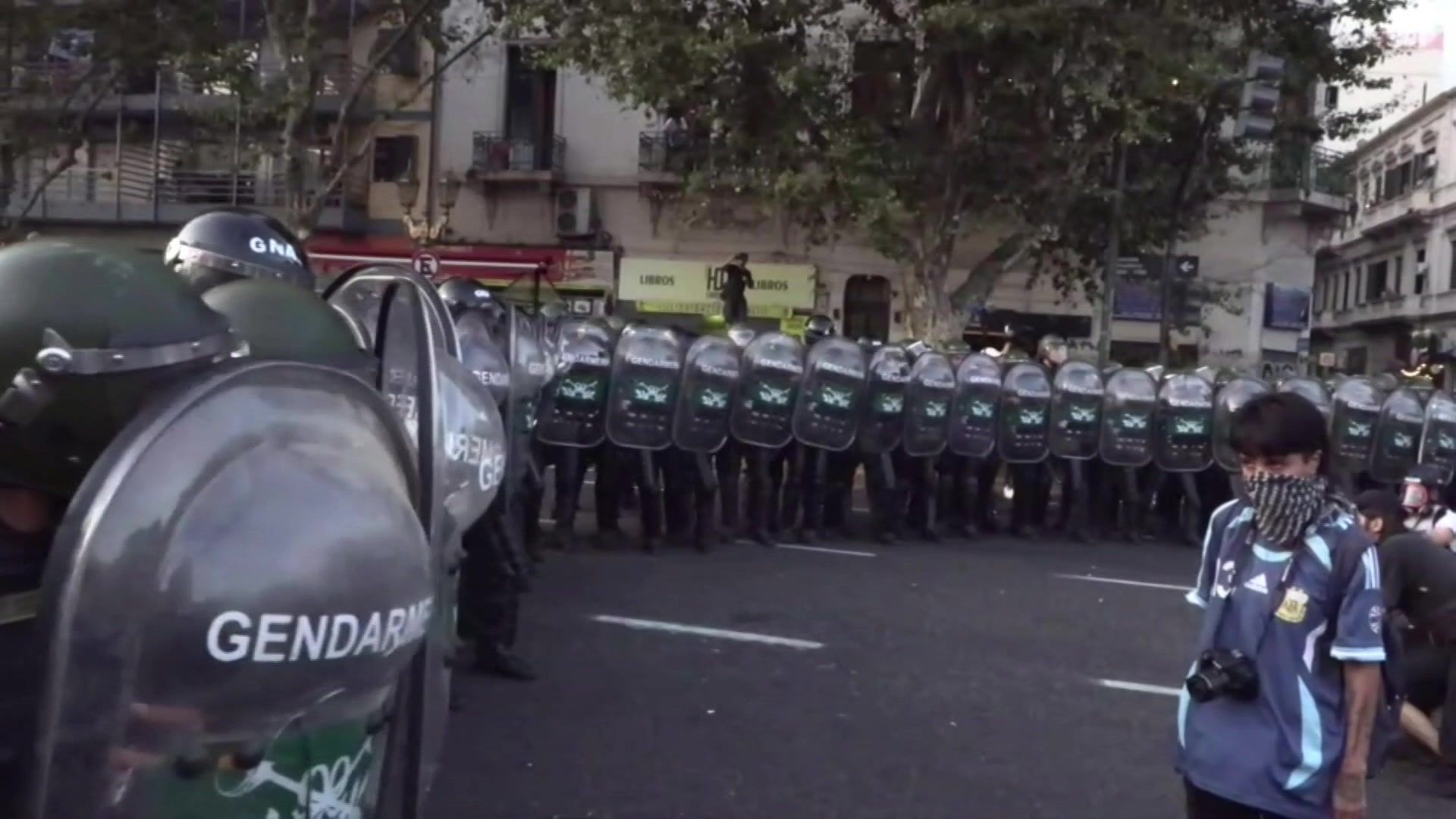 Police, protesters clash outside Argentine Congress as lawmakers continue debate on reforms