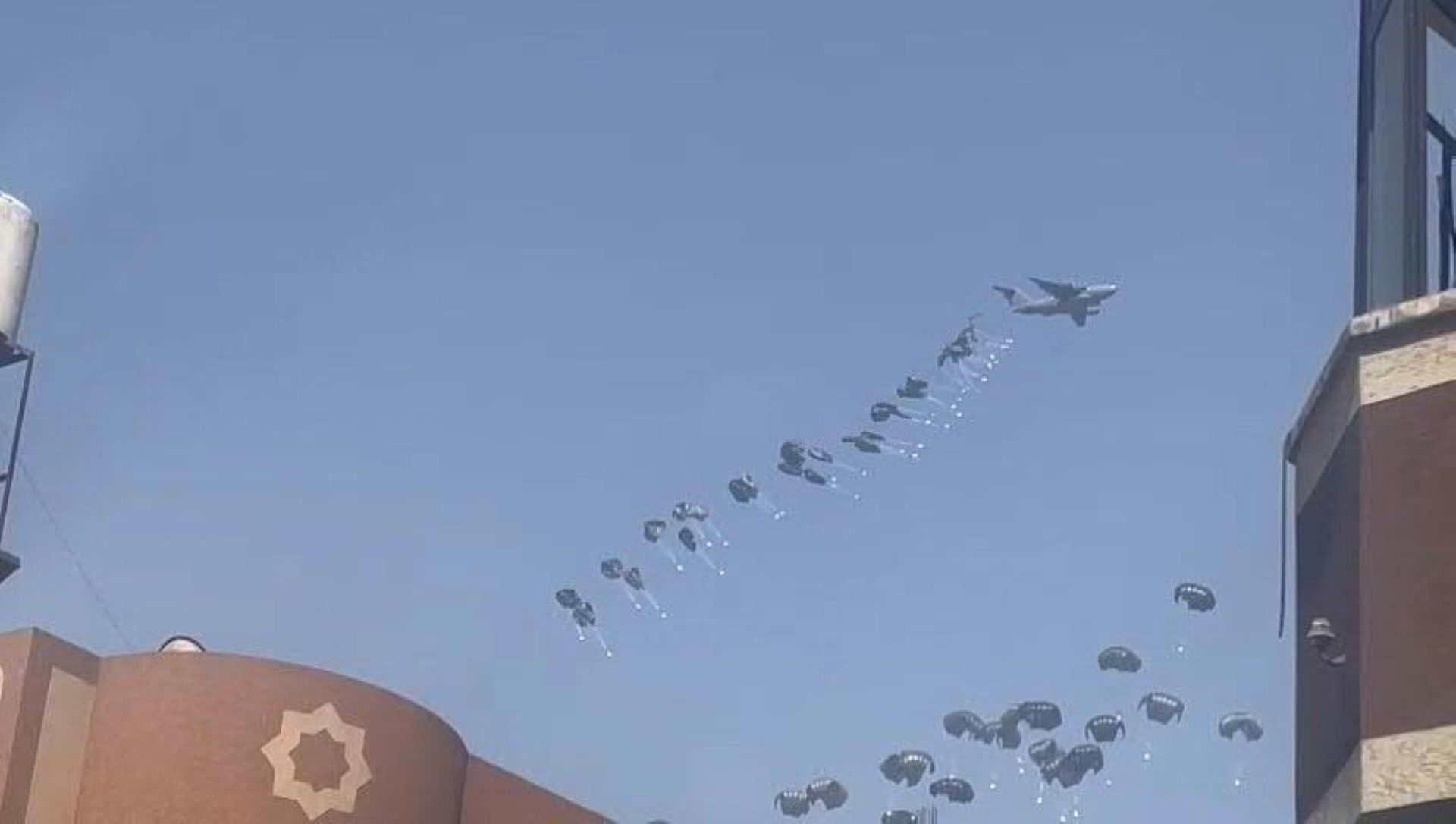 Aid airdrops in Gaza City, loud blasts heard in the west