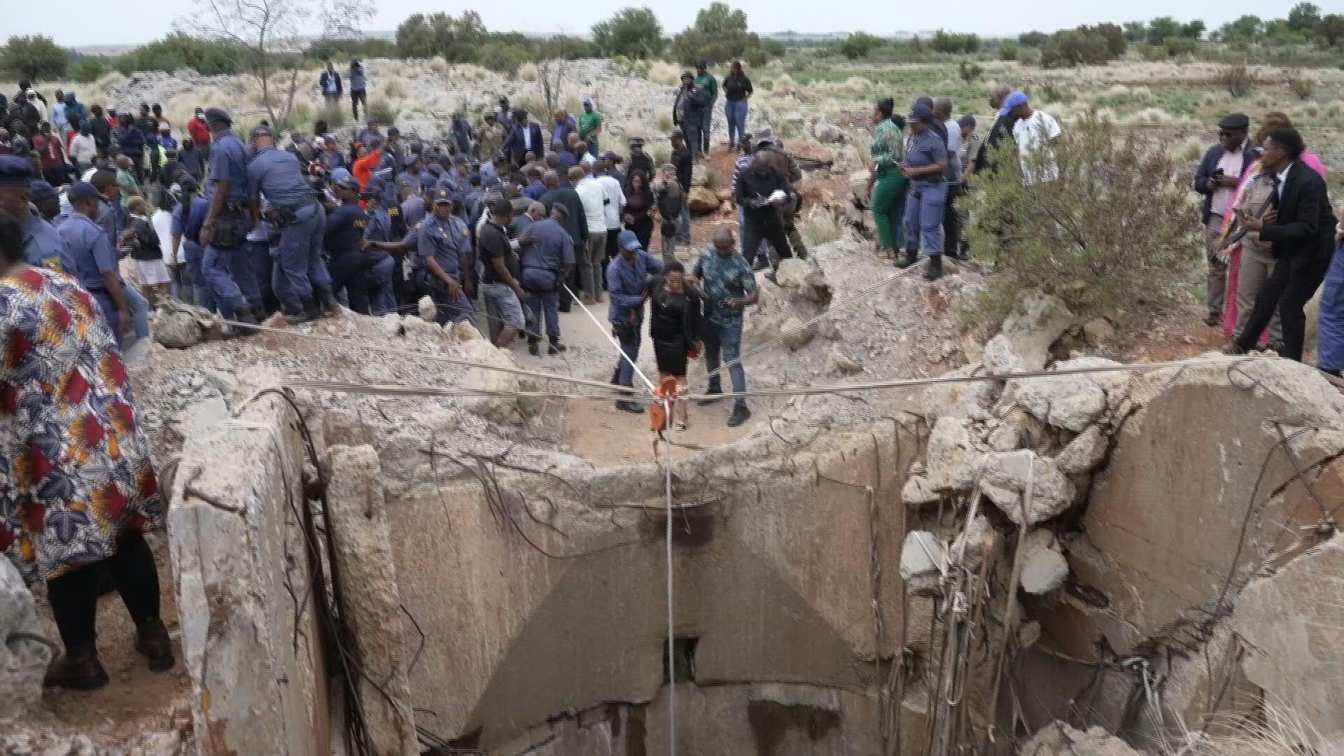 S.Africa police, protesters gather at abandoned mine shaft amidst standoff