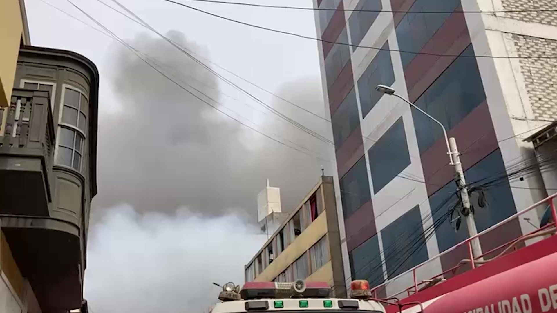 Peruvian firefighters battle major fire in central Lima