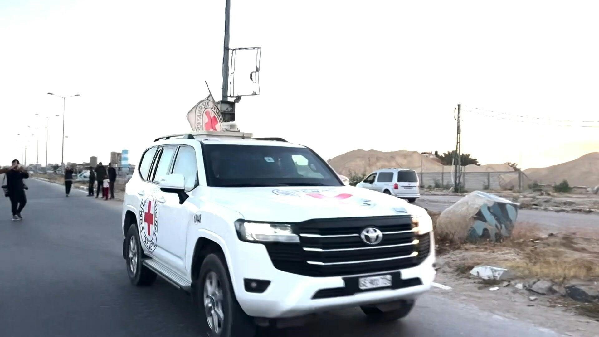 Red Cross vehicles transport freed US-Israeli soldier after Hamas handover