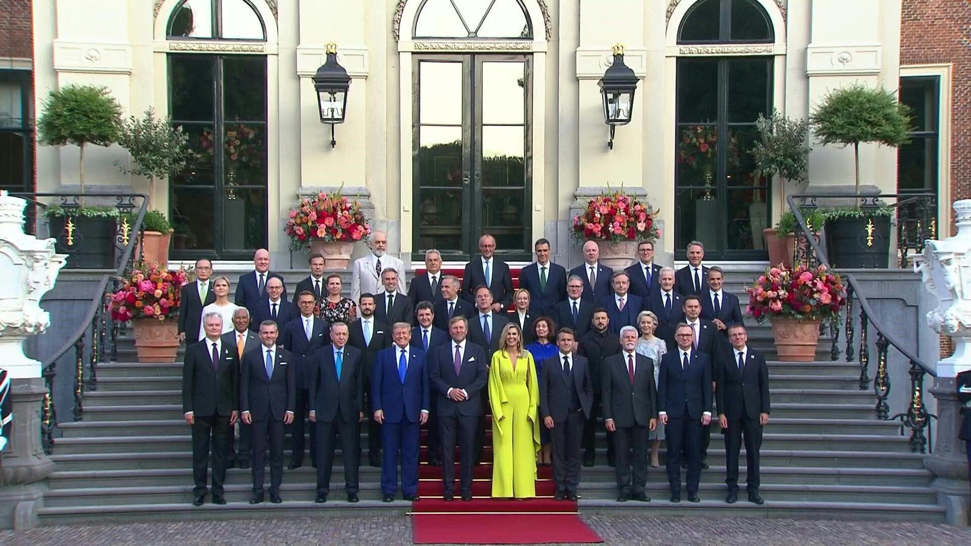 Video: NATO leaders pose for group photo with Dutch Royal family