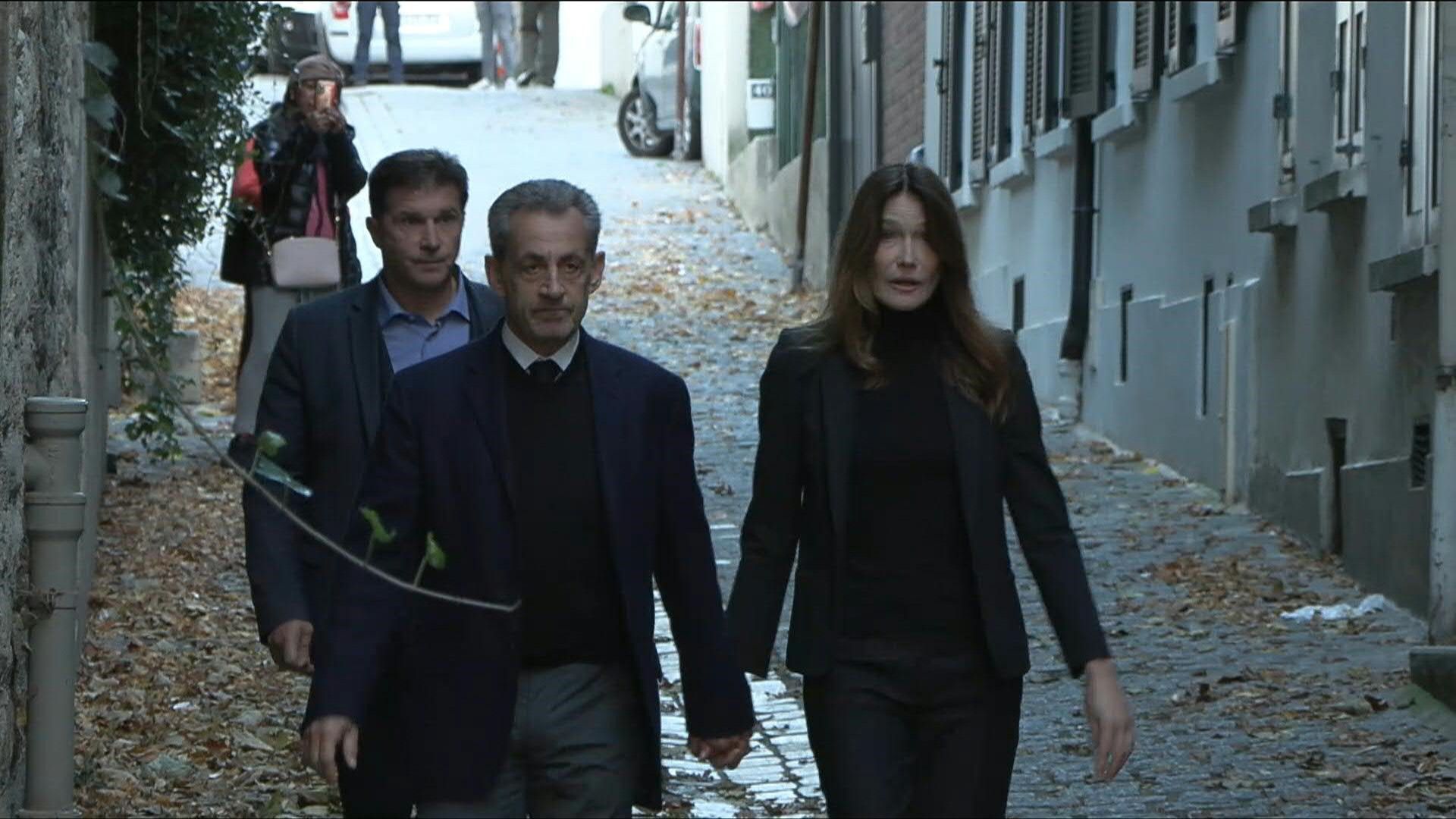 Sarkozy leaves home for La Sante prison, cheered by supporters
