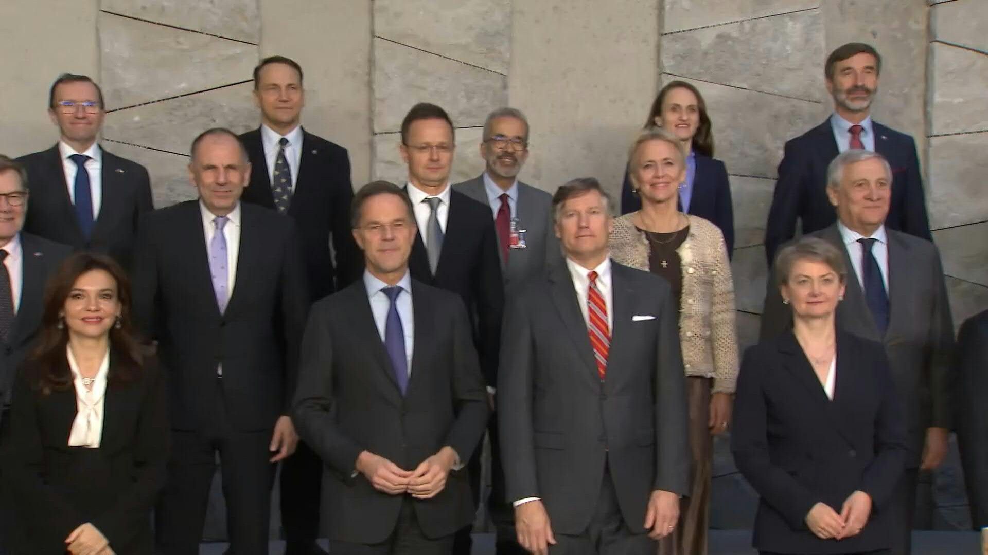 NATO foreign ministers pose for group photo at Brussels meeting