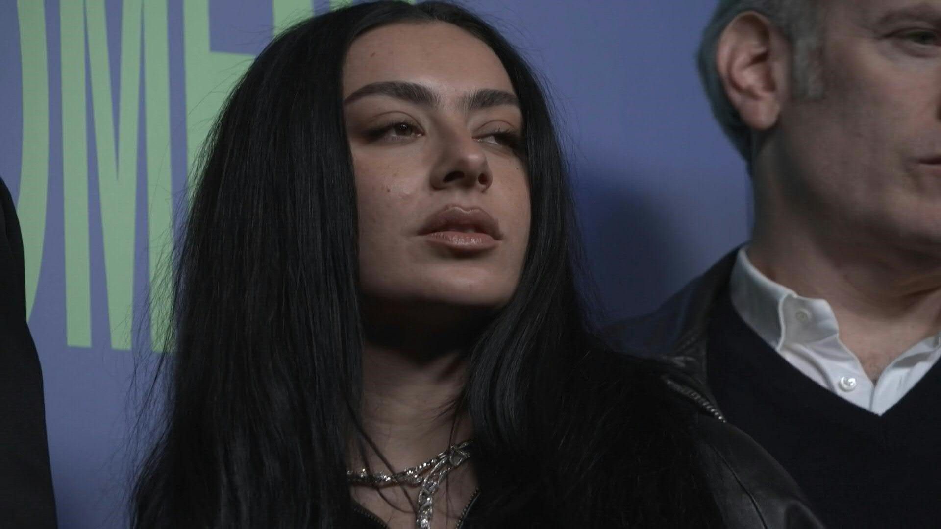 Video: Brat queen Charli xcx on the red carpet for the mockumentary 'The Moment' UK premiere
