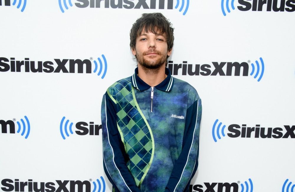 'I don’t do loads of work ': Louis Tomlinson is a 'full-time dad' to his son Freddie whenever he is in Los Angeles