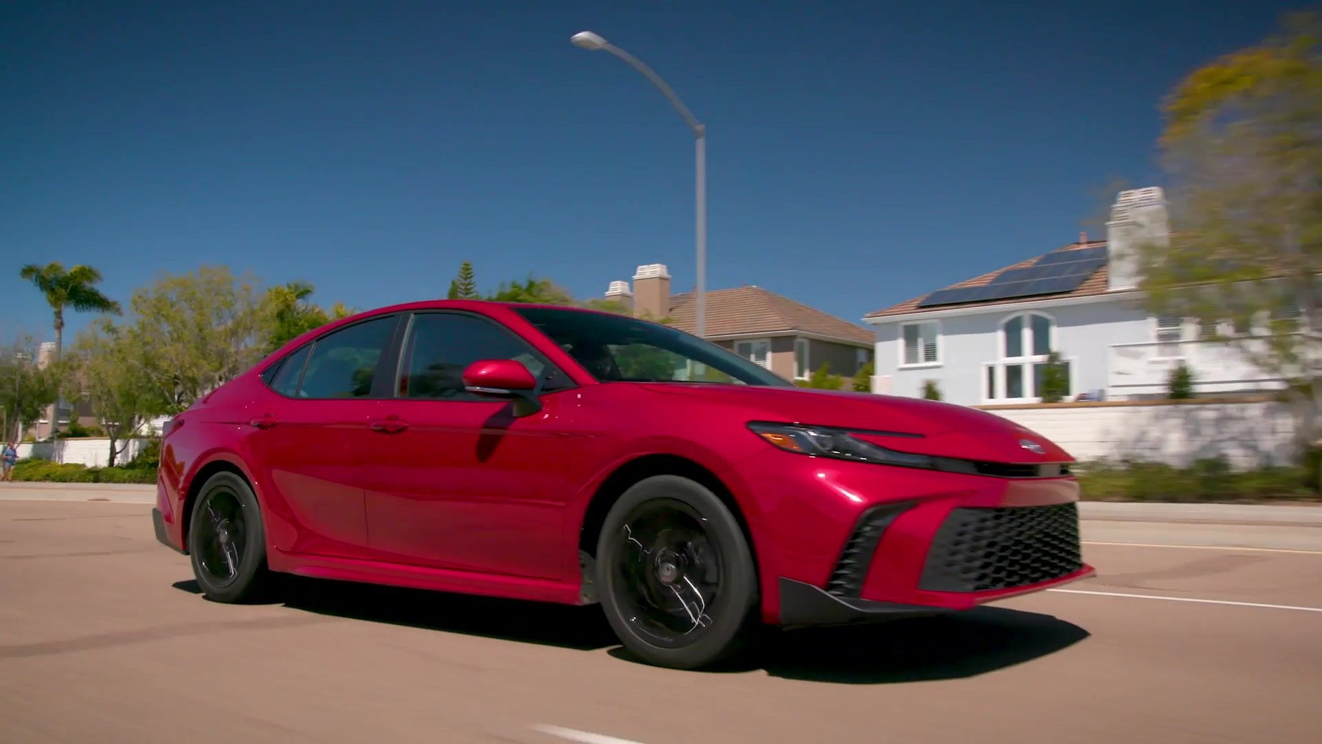2025 Toyota Camry SE AWD in Supersonic Red - Driving Video