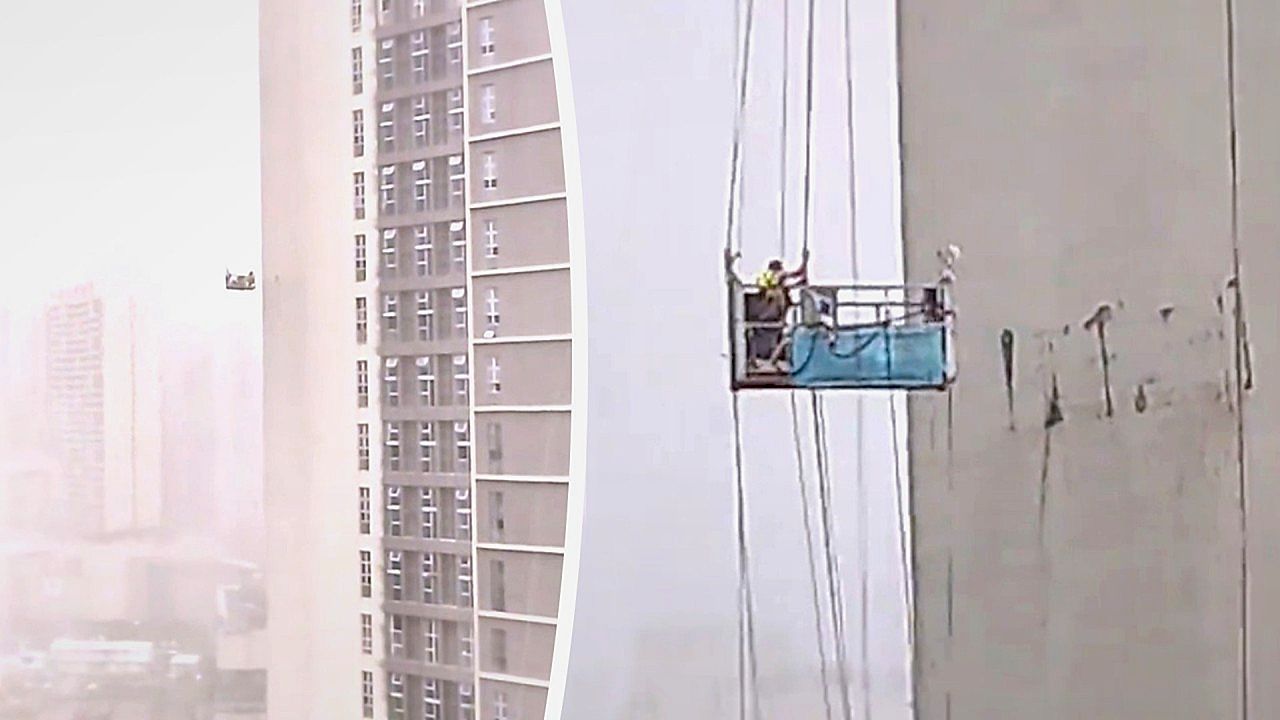 Arbeitsbühne herumgeschleudert: Fensterputzer in China geraten in heftigen Sturm
