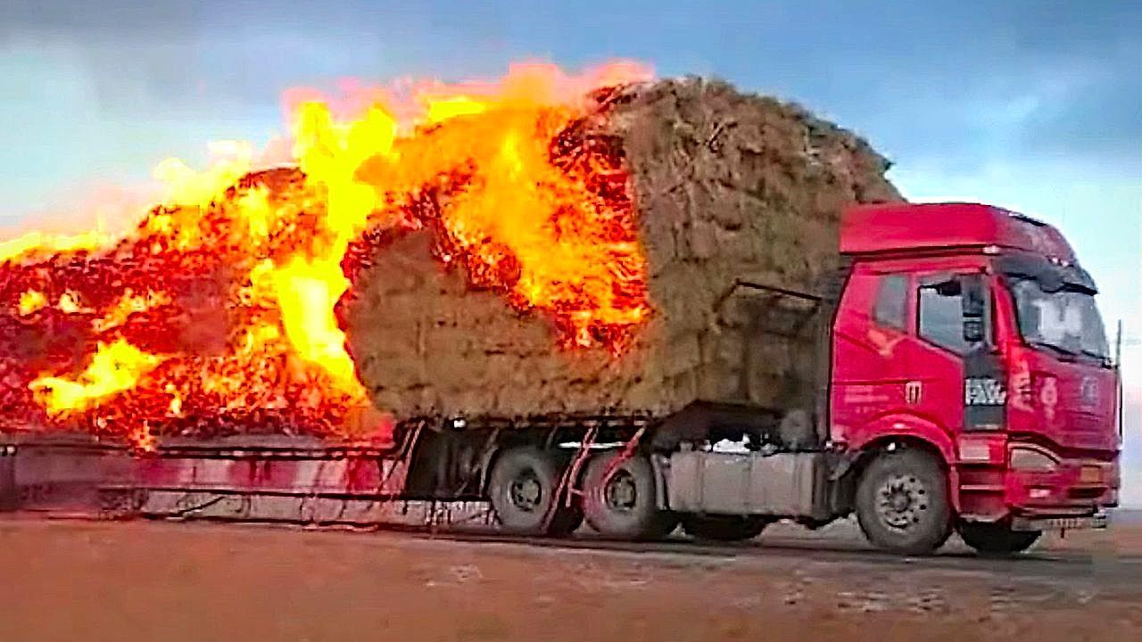 Video: Driver escapes inferno after truck carrying hay bales bursts into flames