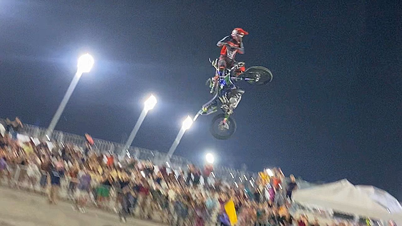 Video: Freestyle motocross rider saves himself after bike malfunctions going up ramp