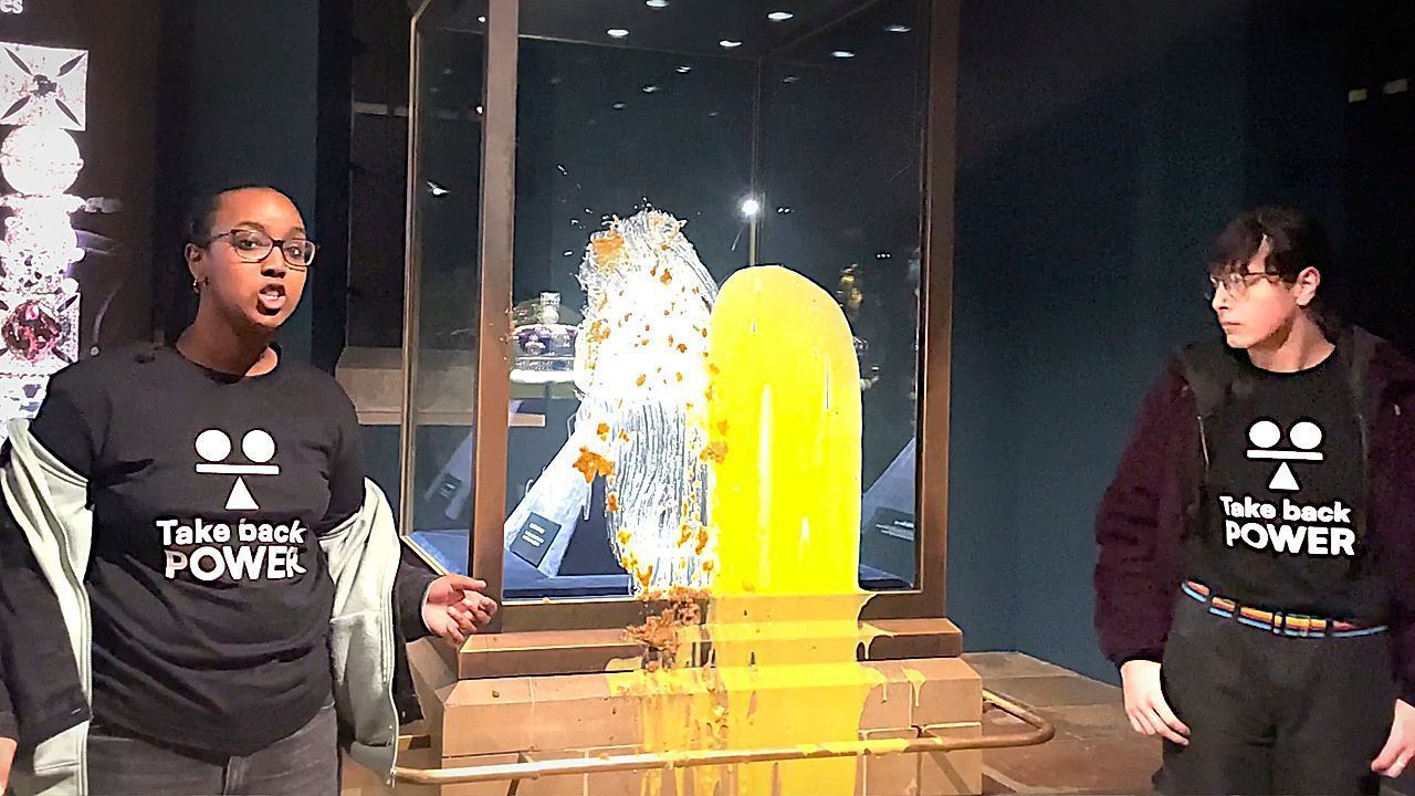 Video: Protesters throw crumble and custard at Crown Jewels in Tower of London stunt