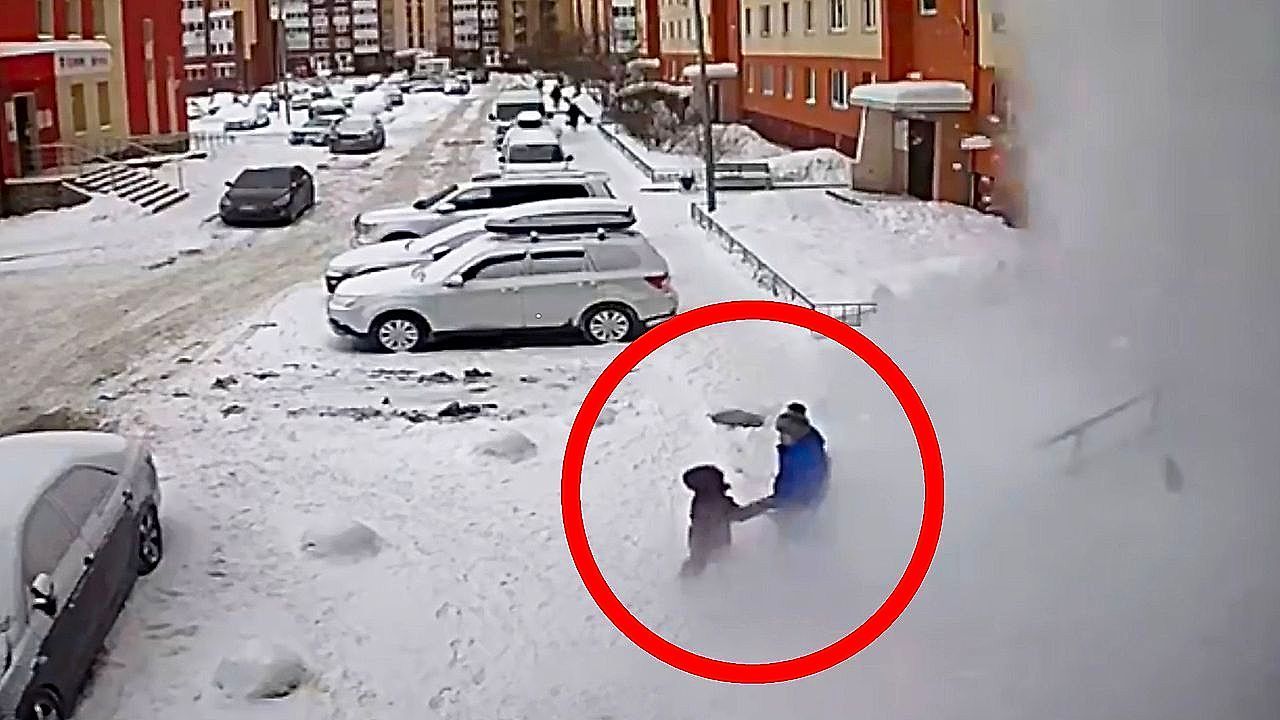 Video: Grandmother shields child from snow slab in Russia