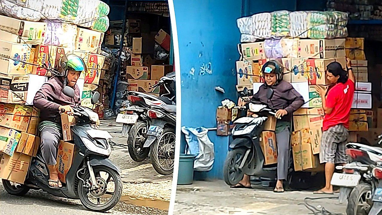 Video: Bis zum Anschlag beladen: Rollerfahrer kämpft mit turmhohen Kartons