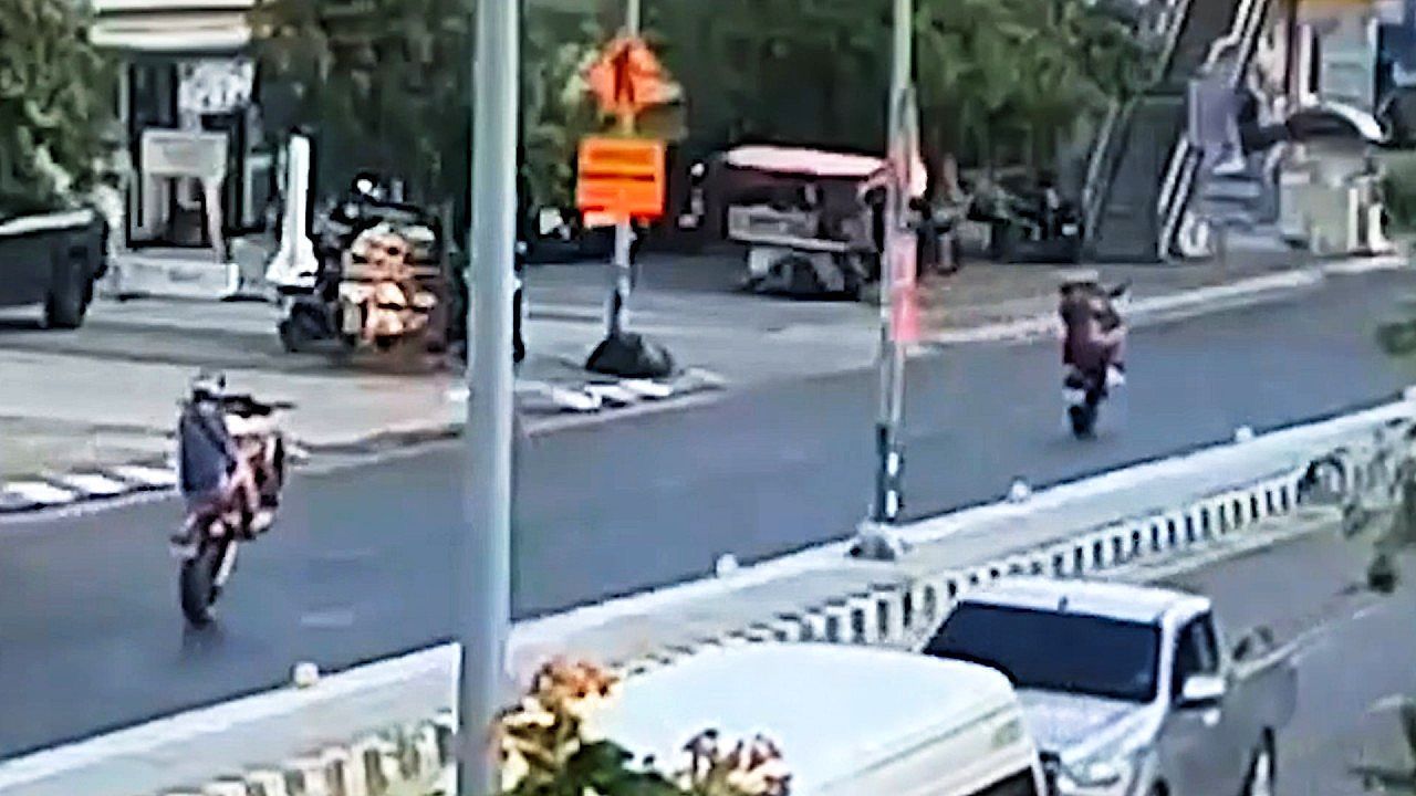 Video: Tourists tracked down after dangerous stunt on busy Thailand road