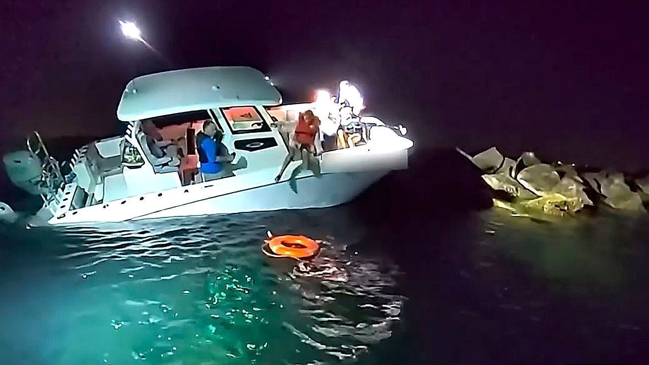 Seven-rescued-after-boat-crashes-into-rocks-in-Florida-inlet