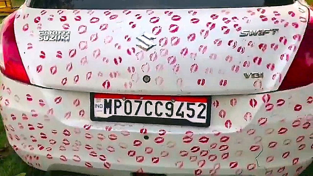 Video: Man fined after girlfriend covers his car in 3,400 lipstick kiss marks