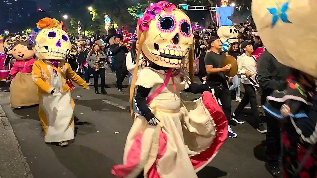 Thousands fill Mexico City streets for spectacular Day of the Dead festivities